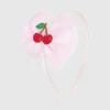 Diadema con lazo de tul de Sweet Wink