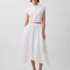 Falda midi de popelín con bajo en forma de pañuelo
