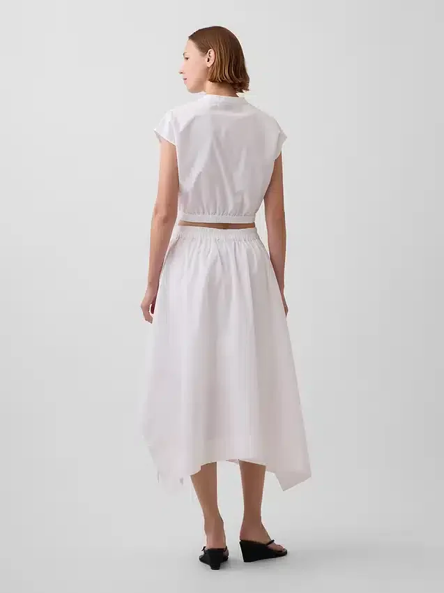 Falda midi de popelín con bajo en forma de pañuelo