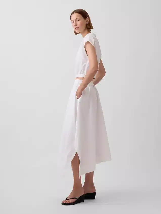 Falda midi de popelín con bajo en forma de pañuelo