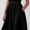 Falda midi de popelín con bajo en forma de pañuelo