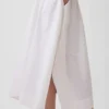 Falda midi de popelín con bajo en forma de pañuelo
