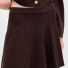 Falda mini de jerséu plisada