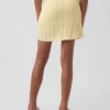 Falda-pantalón de jerséu trenzado para niño