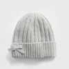Gorro infantil CashSoft con lazo