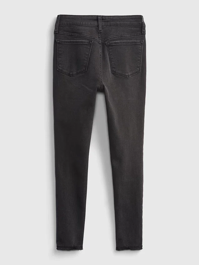 Jeggings de talle alto y efecto desgastado para niña