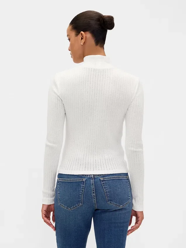 Jersey de cuello alto corto de punto acanalado con punto calado