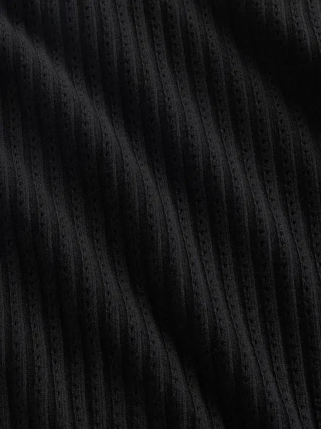 Jersey de cuello alto corto de punto acanalado con punto calado