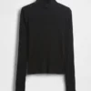 Jersey de cuello alto corto de punto acanalado con punto calado