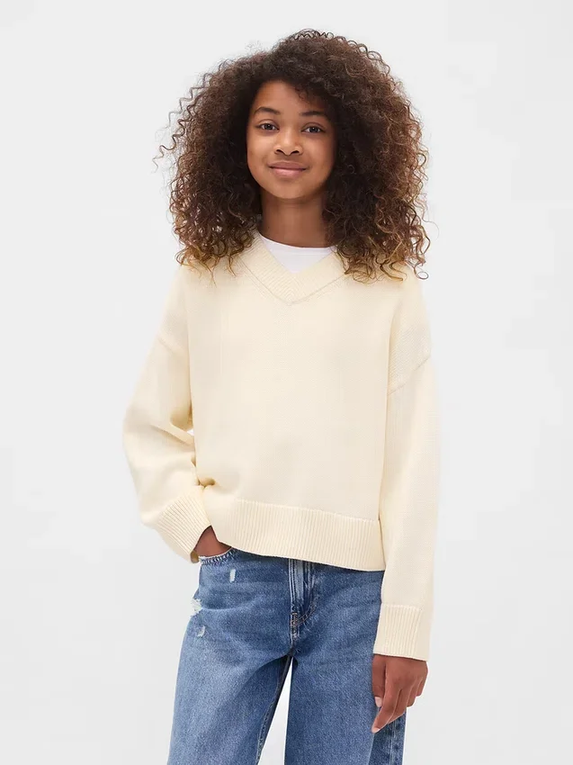 Jersey infantil holgado con cuello en V