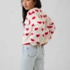 Jersey infantil holgado con cuello redondo y estampado gráfico
