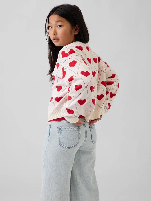 Jersey infantil holgado con cuello redondo y estampado gráfico
