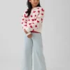 Jersey infantil holgado con cuello redondo y estampado gráfico