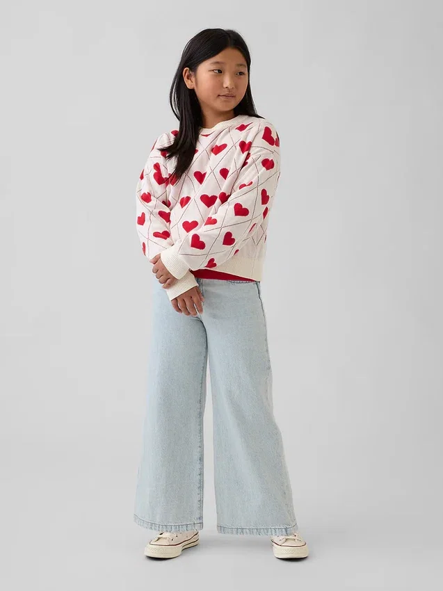 Jersey infantil holgado con cuello redondo y estampado gráfico