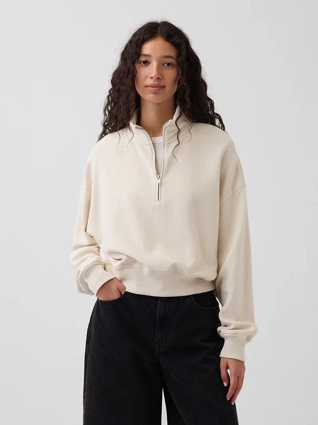 Jersey oversize de algodón texturizado con media cremallera