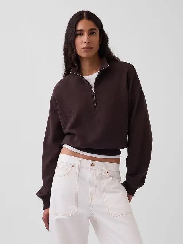 Jersey oversize de algodón texturizado con media cremallera
