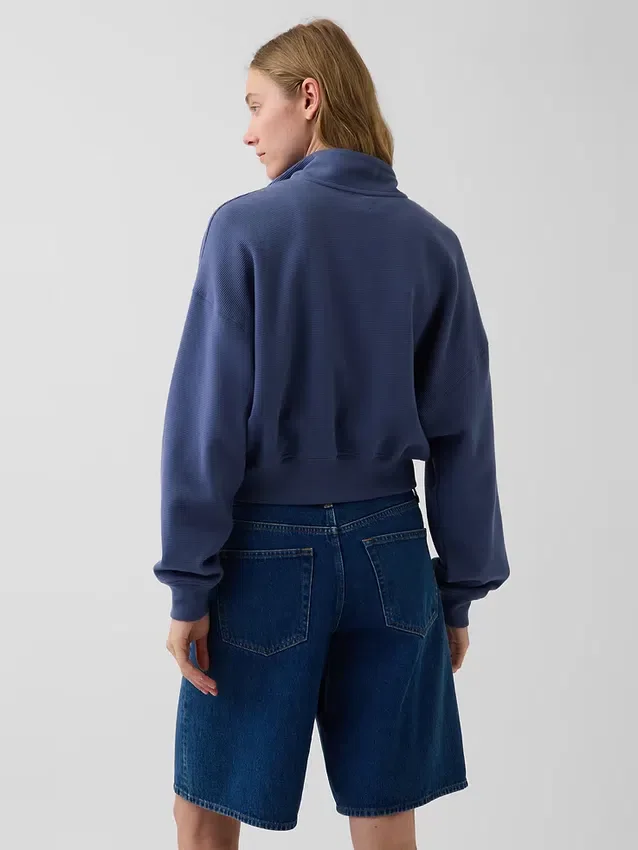 Jersey oversize de algodón texturizado con media cremallera