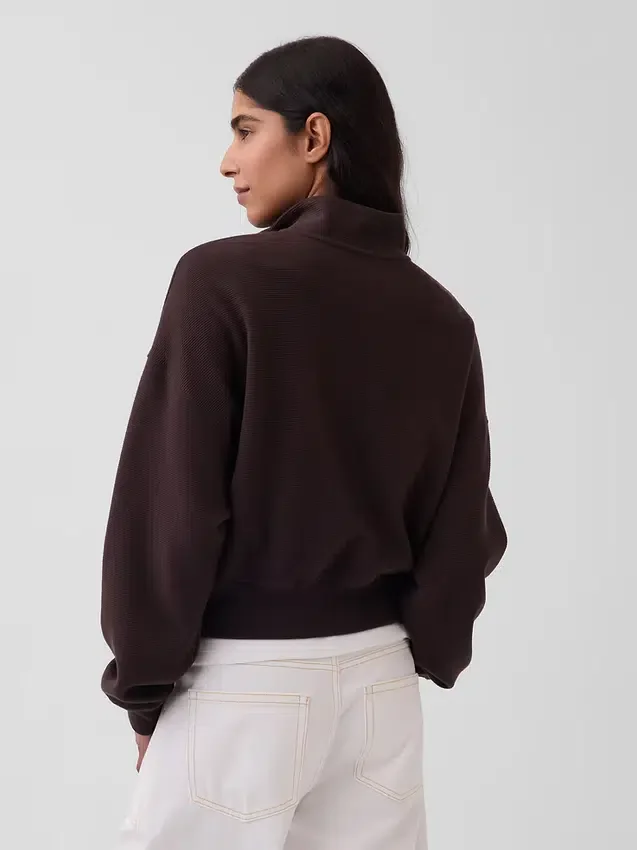 Jersey oversize de algodón texturizado con media cremallera