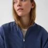 Jersey oversize de algodón texturizado con media cremallera