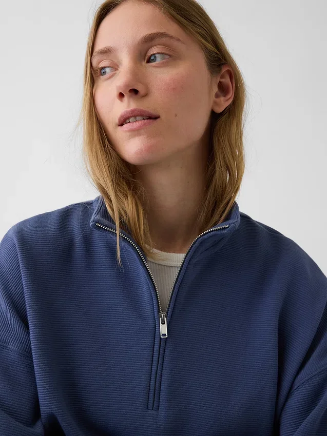 Jersey oversize de algodón texturizado con media cremallera