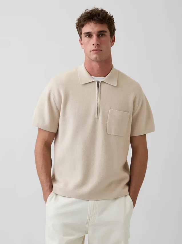 Jersey polo oversize con cremallera de un cuarto y bolsillo
