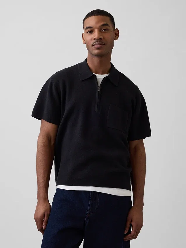 Jersey polo oversize con cremallera de un cuarto y bolsillo