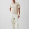 Jersey polo oversize con cremallera de un cuarto y bolsillo