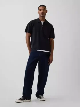 Jersey polo oversize con cremallera de un cuarto y bolsillo