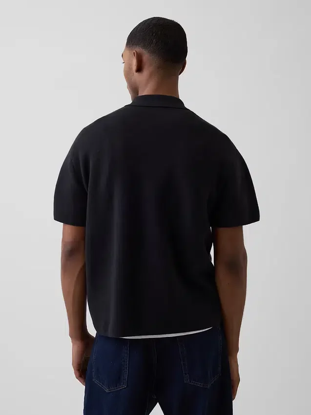 Jersey polo oversize con cremallera de un cuarto y bolsillo