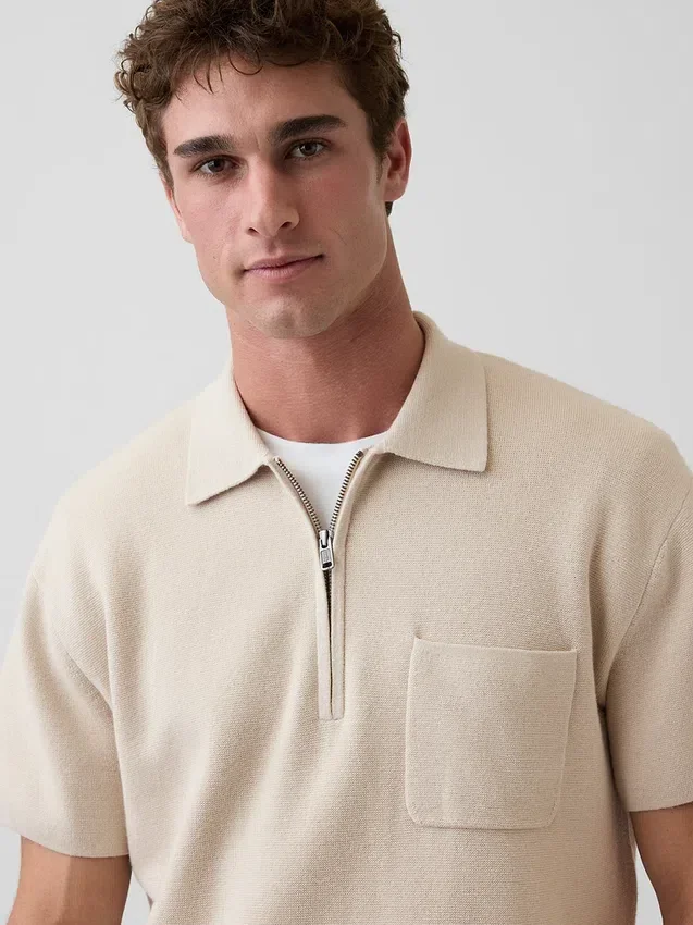 Jersey polo oversize con cremallera de un cuarto y bolsillo