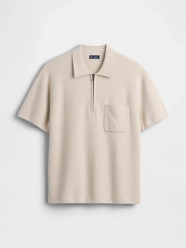Jersey polo oversize con cremallera de un cuarto y bolsillo