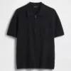 Jersey polo oversize con cremallera de un cuarto y bolsillo