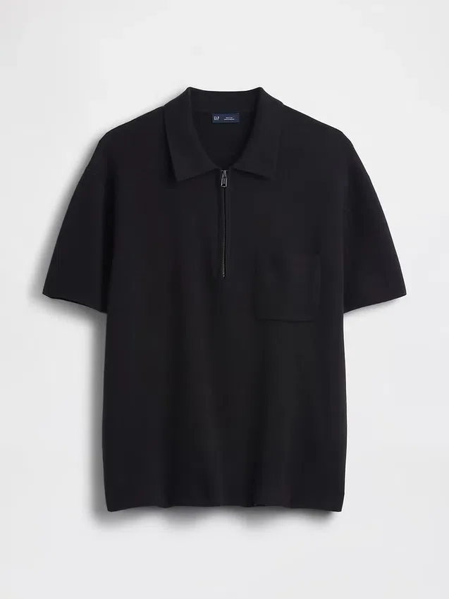 Jersey polo oversize con cremallera de un cuarto y bolsillo