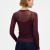 Jersey transparente de cuello alto