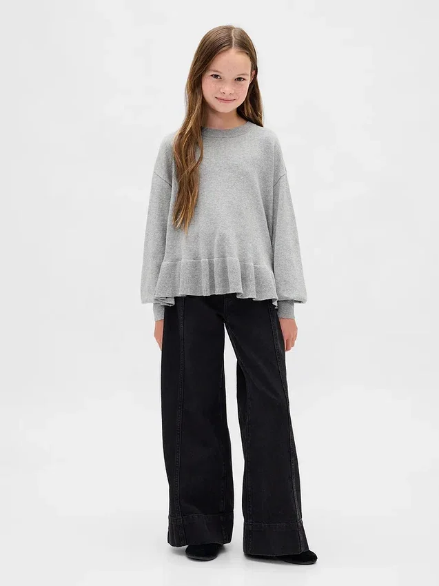Jerséu infantil holgado con peplum