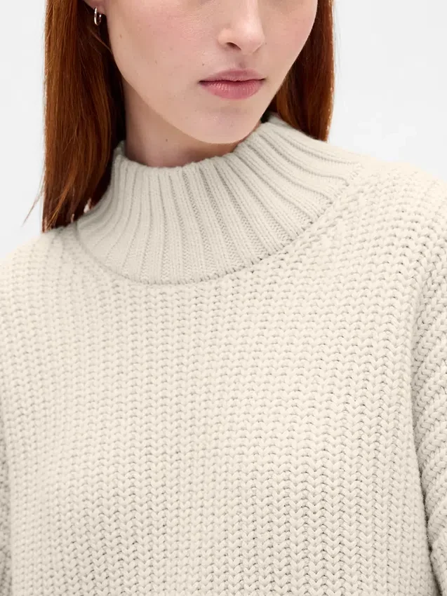 Jerséu mini de punto con cuello alto oversize