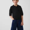 Jerséu polo holgado para niño