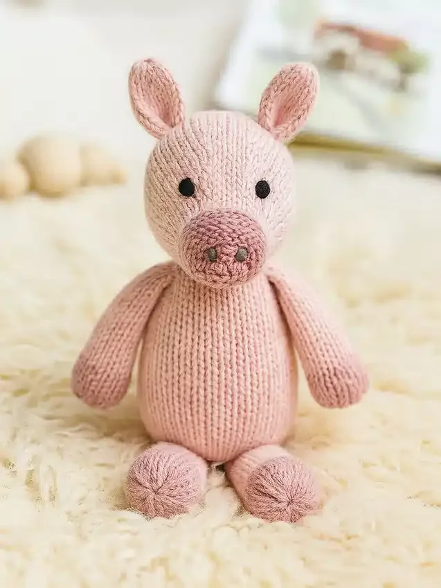 Juguete de punto con forma de cerdito