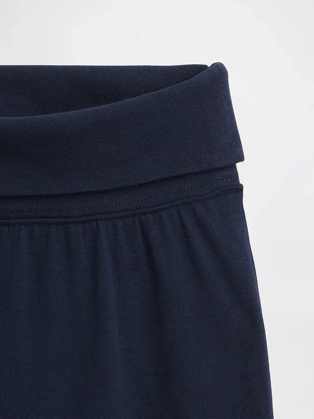 Leggings infantiles de pierna ancha con vuelta