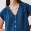 Minivestido camisero de denim de gasa de algodón con cintura baja