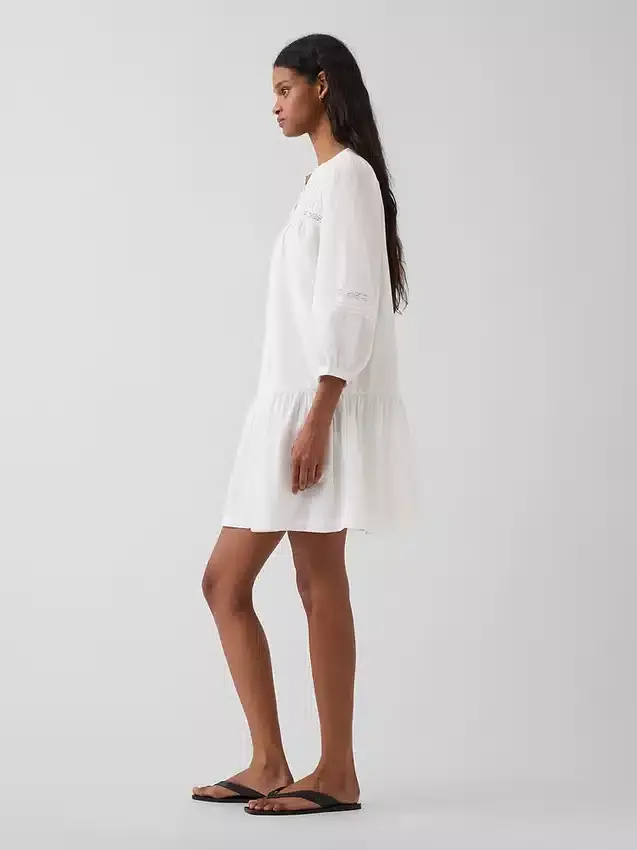 Minivestido de cintura baja con ribete de encaje