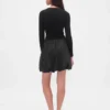 Minivestido de estilo «bubble» con mezcla de tejidos