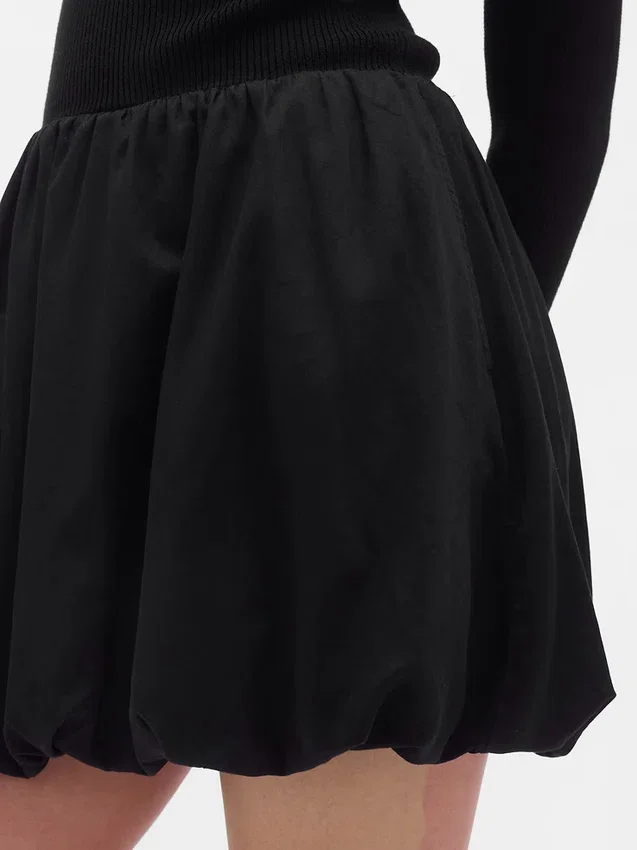 Minivestido de estilo «bubble» con mezcla de tejidos