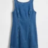 Minivestido vaquero con cuello barco y espalda abierta
