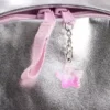 Mochila infantil con colgantes metalizados