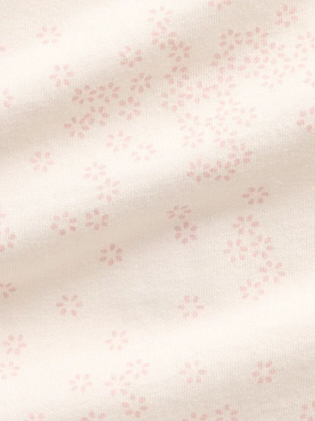 Mono con pies de algodón orgánico y estampado floral para bebé