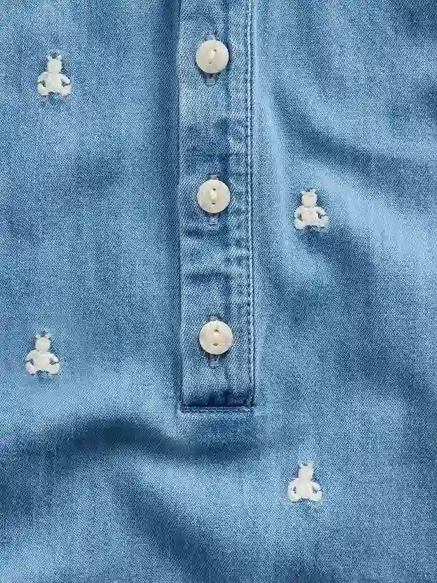 Mono corto de denim para bebé con el oso Brannan bordado