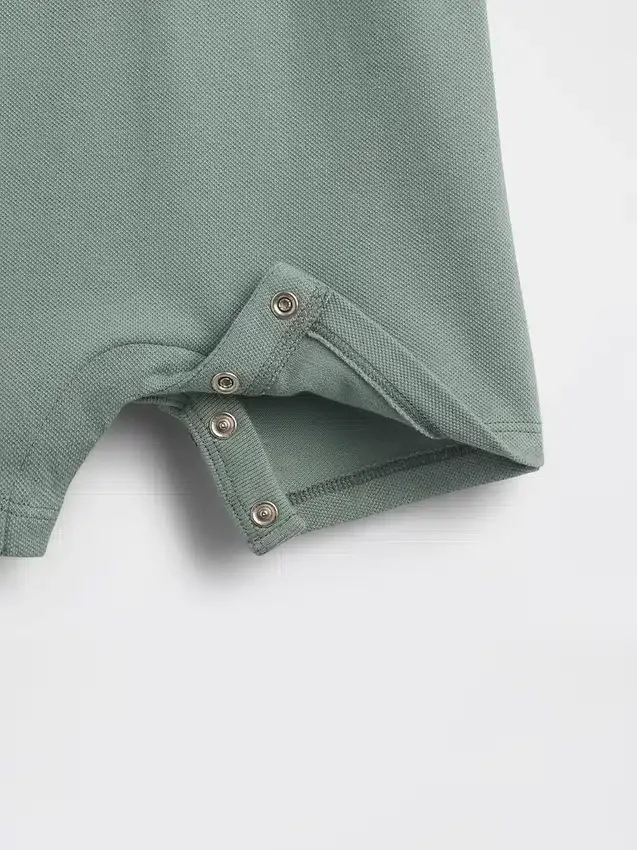 Mono corto de polo de piqué para bebé