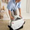 Pack de cuna de viaje Babybjorn Light y sábana bajera