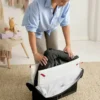 Pack de cuna de viaje Babybjorn Light y sábana bajera
